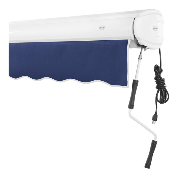 A navy and white Awntech Key West retractable patio awning with a cord.