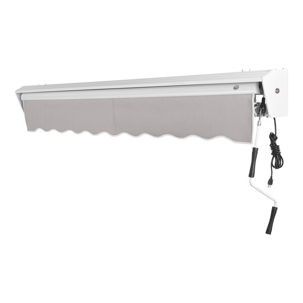 A gray Awntech retractable patio awning with a protective hood over a window.