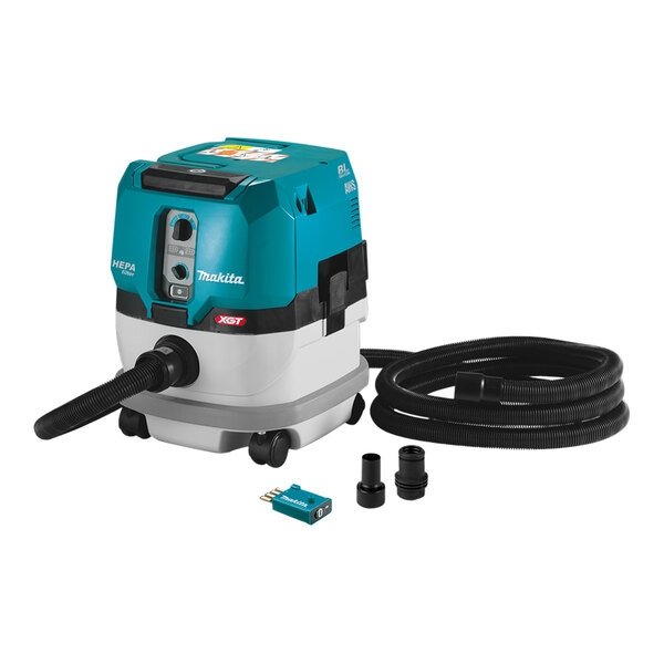 A blue and white Makita vacuum cleaner with a hose.