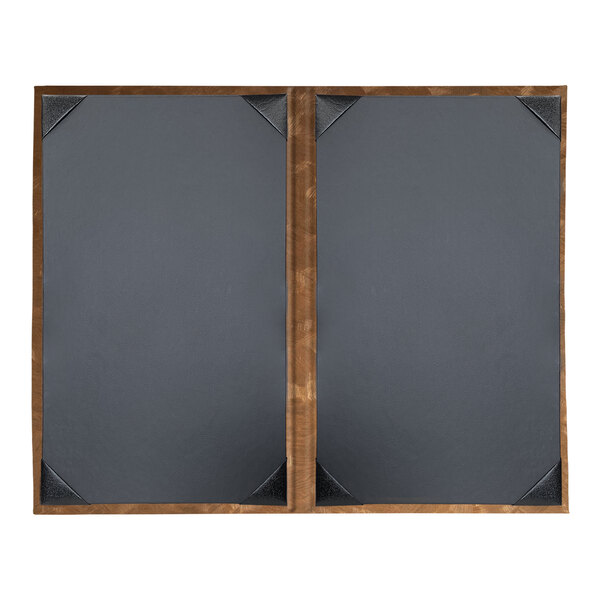 A grey board with a wooden frame on a table in a bar.