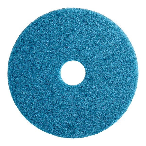 A blue Lavex floor cleaning pad with a hole in the middle.