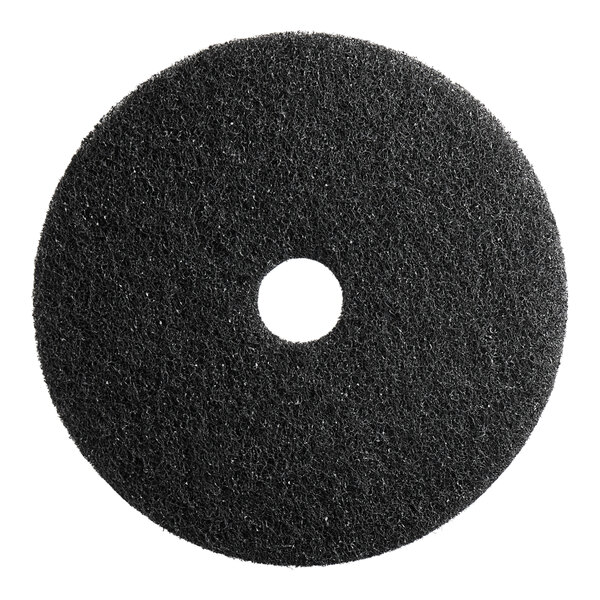A black circular Lavex stripping pad with a hole in the center.