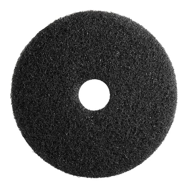 A black circular Lavex stripping pad with a white circle in the middle.