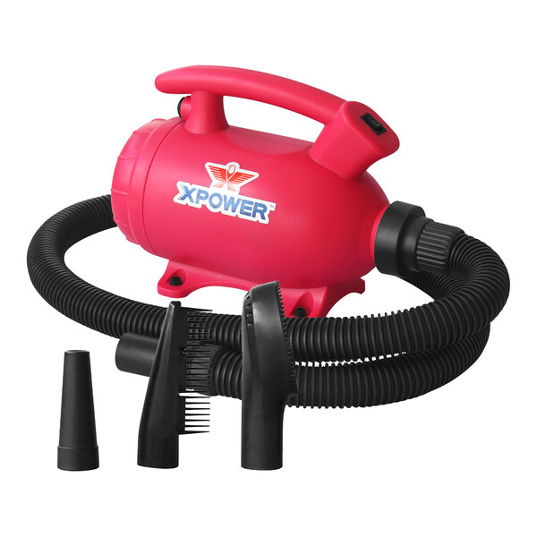 A pink XPOWER portable air blower with black tubes.