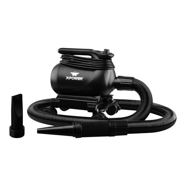 A black XPOWER car dryer with a hose and nozzle.