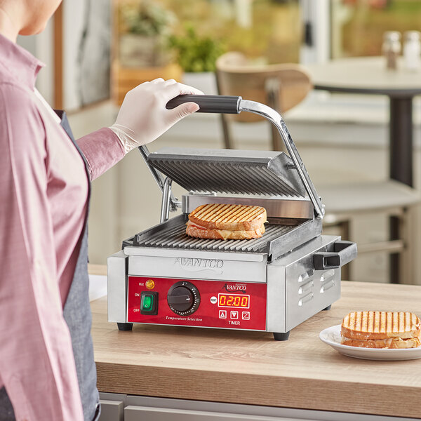 Avantco PG100T Commercial Panini Sandwich Grill with Timer, Grooved Plates, and 8 1/2" x 8 1/2" Cooking Surface - 120V, 1750W