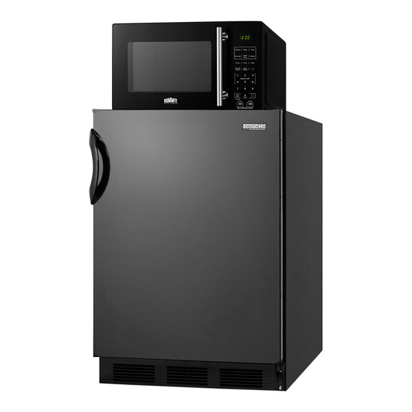 A black Summit Appliance refrigerator with a microwave on top.