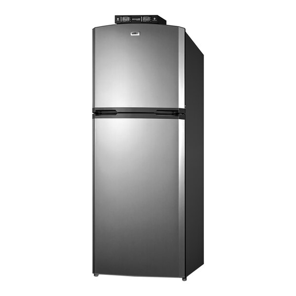 A Summit stainless steel refrigerator with black doors and handles.