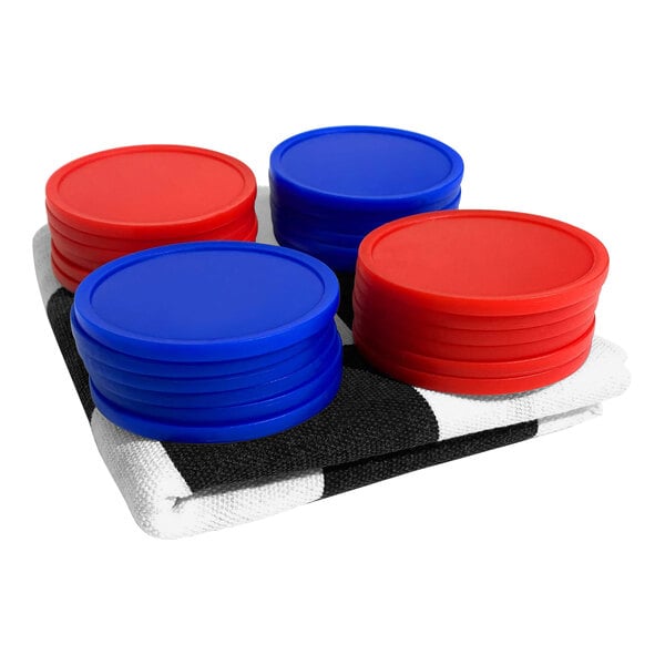 A stack of red and blue plastic chips next to a stack of blue plastic chips.