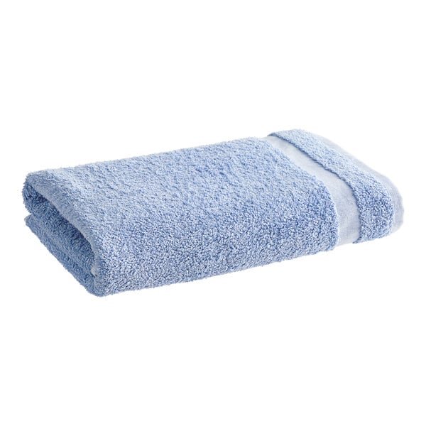 A blue 1888 Mills Fibertone bath towel.
