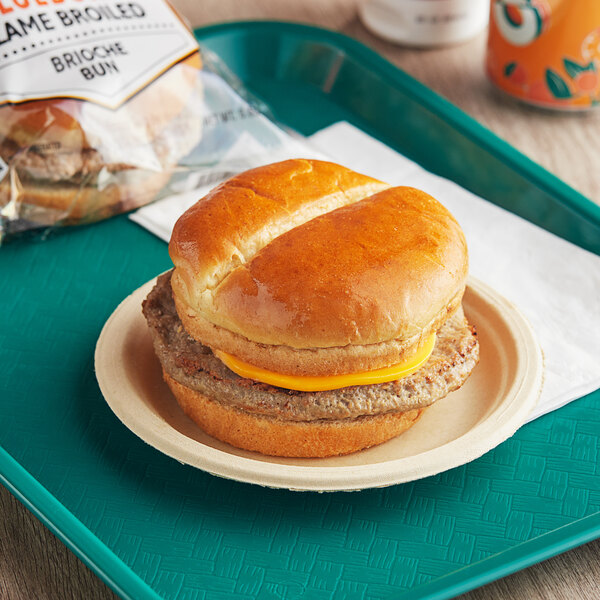 A Grand Prairie cheeseburger sandwich on a plate.