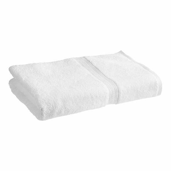 A folded white 1888 Mills Magnificence bath towel.