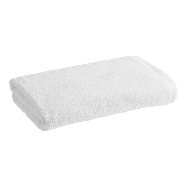 A folded white 1888 Mills True Comfort bath towel.