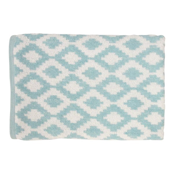 A teal cotton and polyester pool towel with a blue and white diamond pattern.