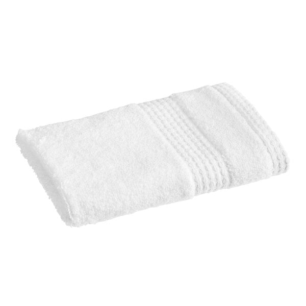 A 1888 Mills white washcloth with a white border.