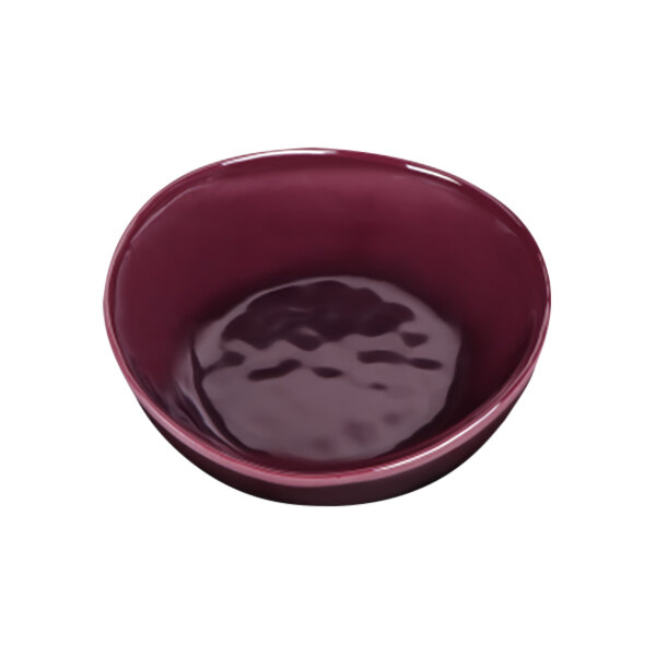 A close up of an Elite Global Solutions purple melamine bowl with a dark purple rim.