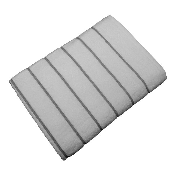 A white pool towel with gray stripes.