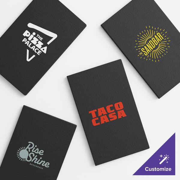A set of black vinyl menu booklets with various custom restaurant logos on the covers.