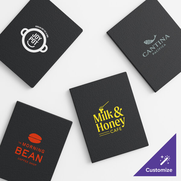 A set of black vinyl menu booklets with customizable covers featuring various restaurant logos.