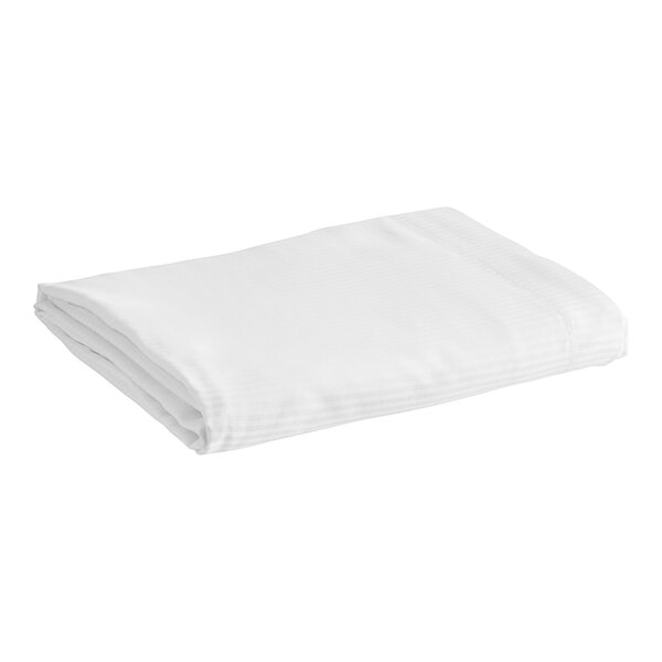 A white 1888 Mills Magnificence T-310 flat sheet with tone on tone stripes folded on a white background.