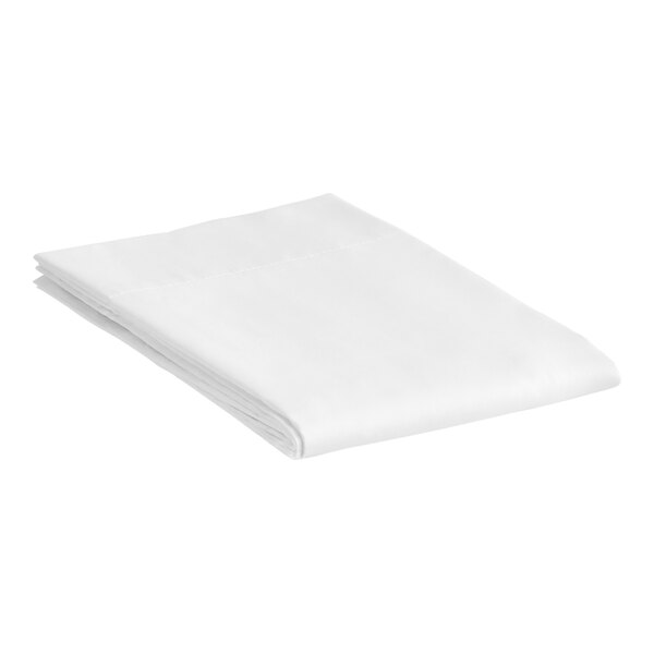 A stack of folded white 1888 Mills Oasis pillowcases.