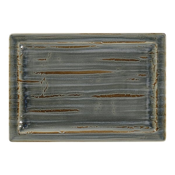 A rectangular peridot porcelain tray with a brown pattern.