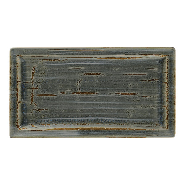 A rectangular RAK Porcelain tray with a grey and brown speckled surface.