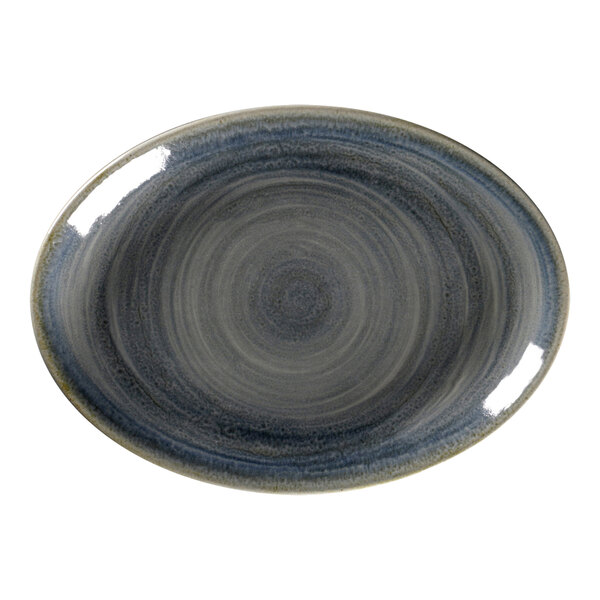 A jade green RAK Porcelain oval platter with a circular pattern on the rim.