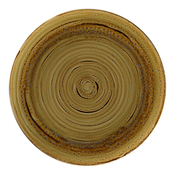 A brown RAK Porcelain flat coupe plate with a circular design on it.