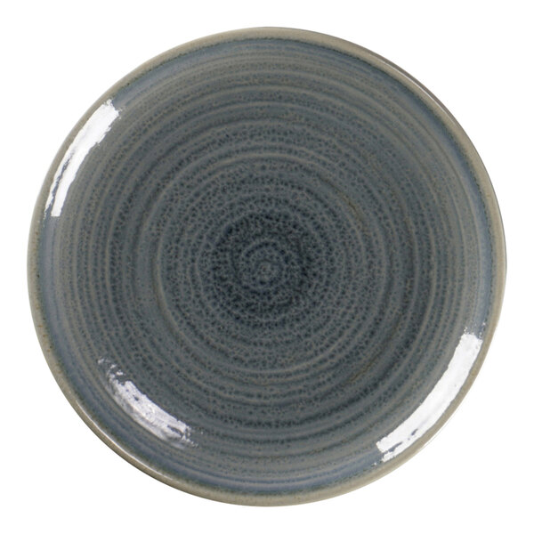 A close-up of a jade porcelain RAKstone spot plate with a circular pattern.