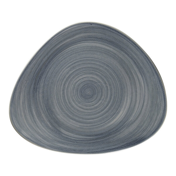 A grey RAK Porcelain flat organic plate with a spiral pattern on it.