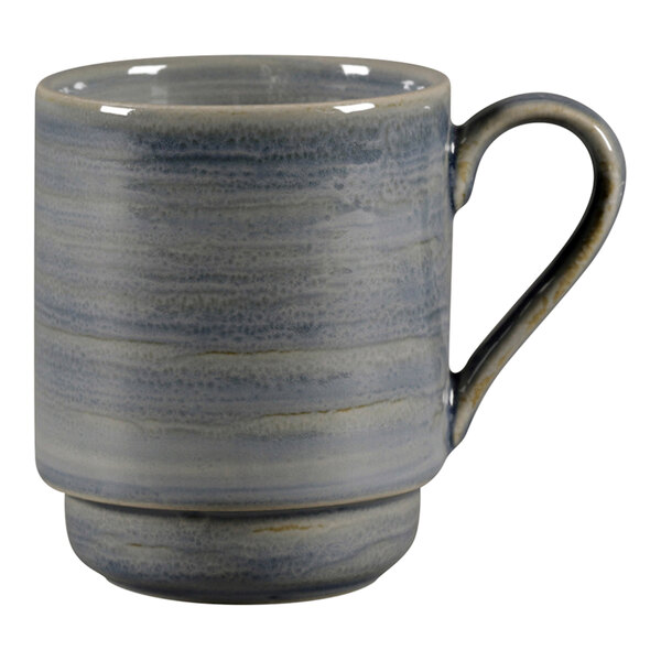 A jade RAK Porcelain mug with a handle.