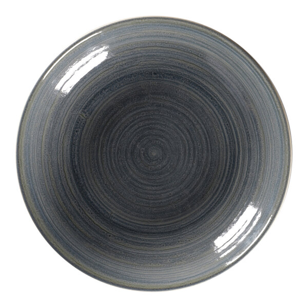 A jade porcelain deep coupe plate with a circular pattern in the center.