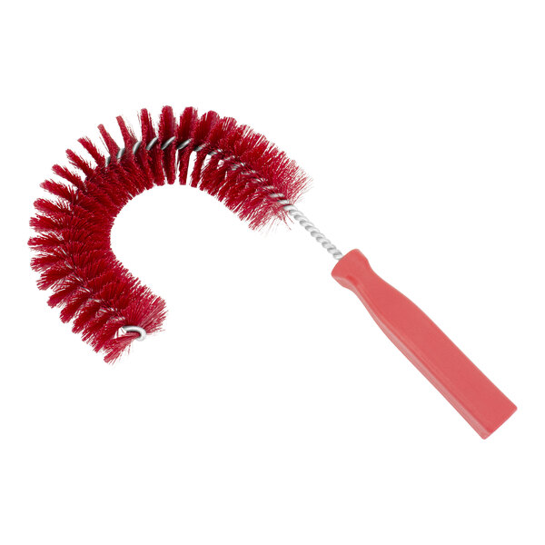 A red Carlisle Sparta cleaning brush with a handle.