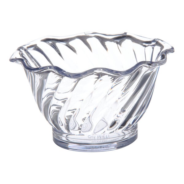 A clear plastic Dinex tulip swirl bowl with a wavy edge.