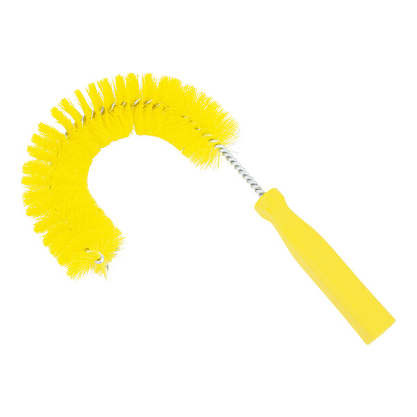 A yellow brush with a handle.
