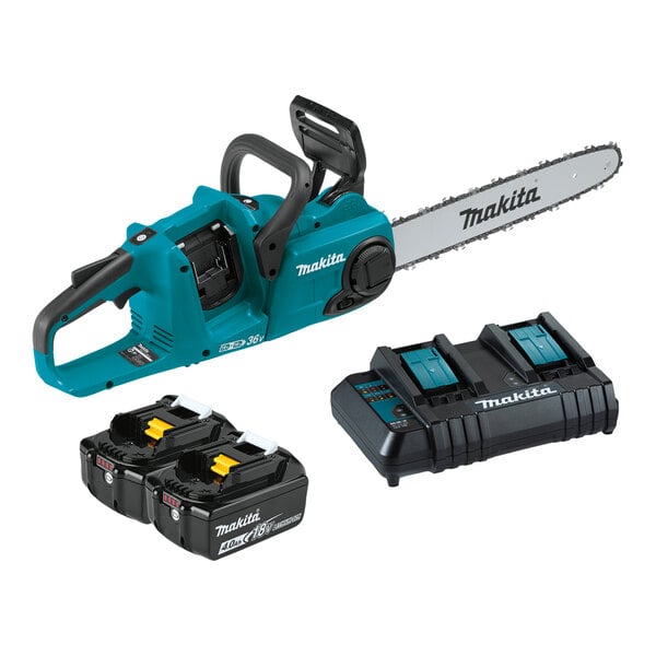 A blue and black Makita chainsaw with two black batteries and a black and blue dual port charger.