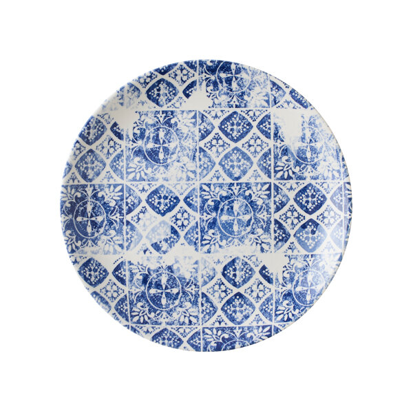 A Dudson Maker's Porto blue and white plate with a circular design.