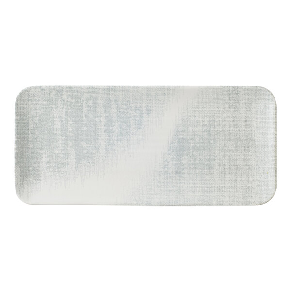 A rectangular white plate with a grey border.