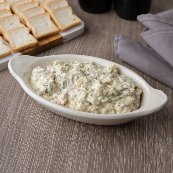 Hall China 5280AWHA Ivory (American White) 12 oz. Oval Rarebit / Au