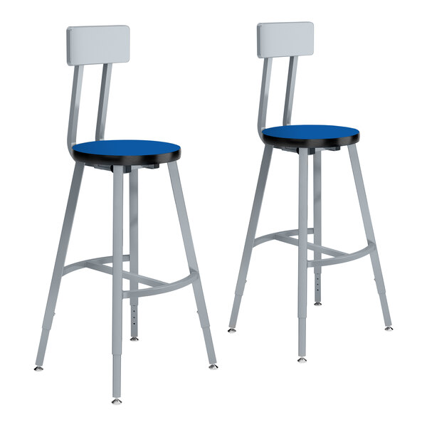 A pair of National Public Seating gray steel lab stools with Persian blue laminate seat and backrests.