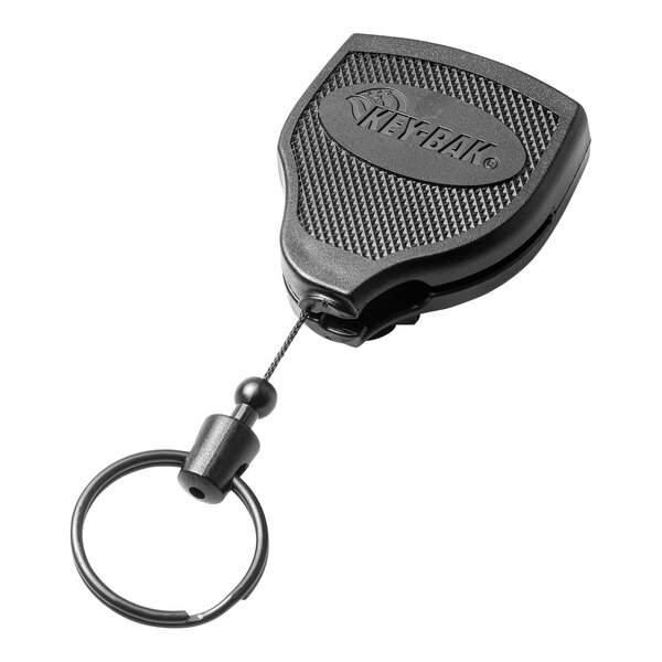 A black KEY-BAK keychain with a metal ring.