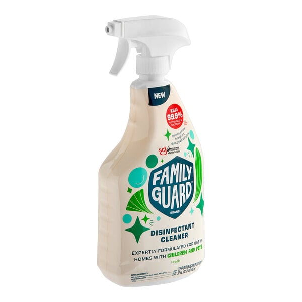 A white FamilyGuard spray bottle with blue and green labels.