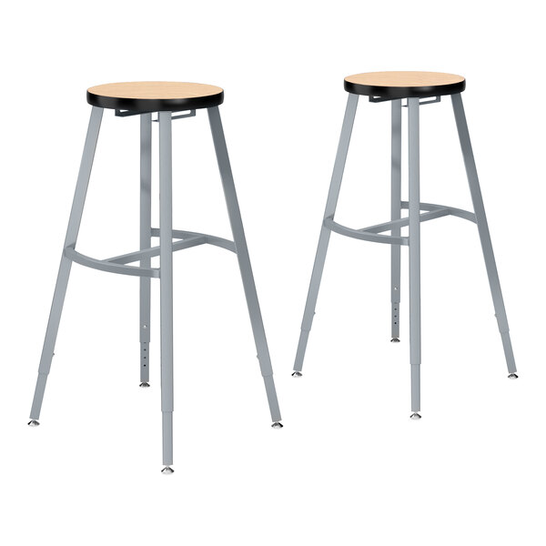 Two National Public Seating metal lab stools with Fusion Maple high-pressure laminate seats.