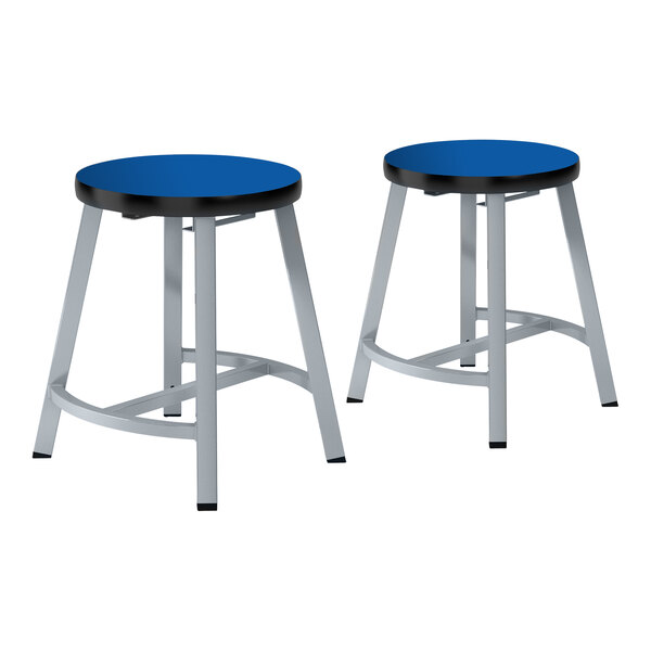 Two National Public Seating metal lab stools with blue high-pressure laminate seats and steel legs.