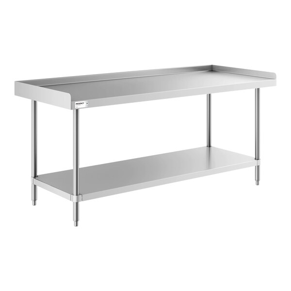 A stainless steel work table with a raised edge on three sides and an undershelf for additional storage.