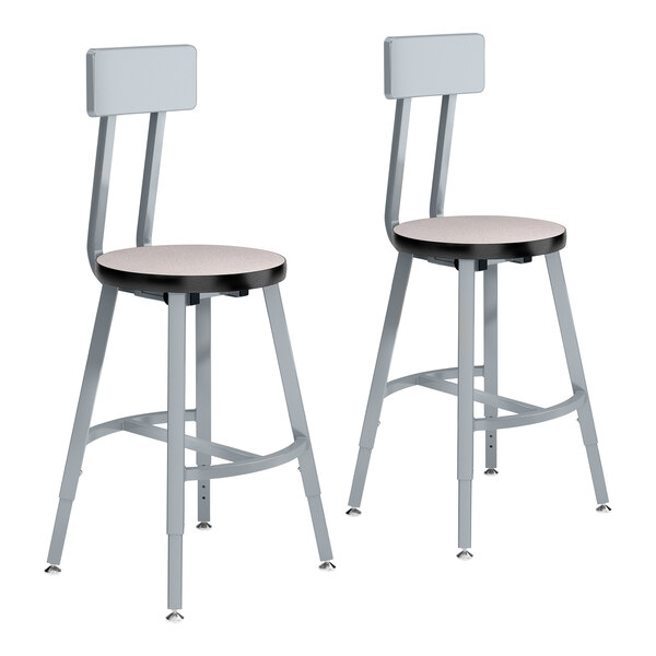 A pair of National Public Seating steel lab stools with gray high-pressure laminate seats and backrests.