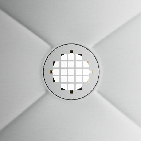 A white circular stainless steel mop sink cabinet.
