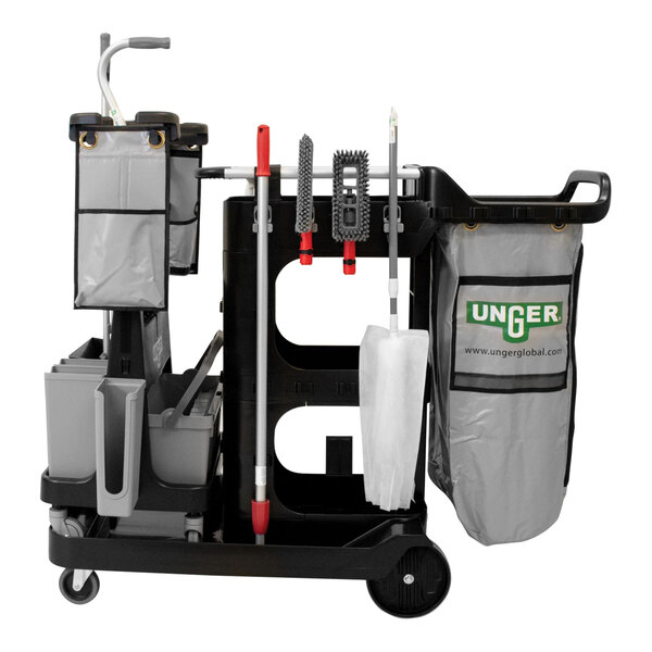 An Unger OmniClean RestroomRX Spot Cleaning Kit on a black and white cleaning cart with two grey bags.