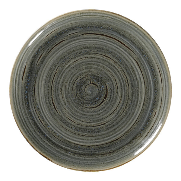 A close up of a RAK Porcelain peridot flat coupe plate with a spiral pattern on it.